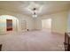 Spacious living room featuring an open layout and neutral tones, awaiting personal touches at 113 2Nd St, Spencer, NC 28159