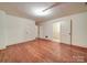 Spacious living room featuring hardwood floors, white trim, and ample natural light at 113 2Nd St, Spencer, NC 28159