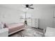 Cozy bedroom with a bed, dresser, and ample natural light from two windows, creating a peaceful atmosphere at 127 Giant Oak Ave, Statesville, NC 28677