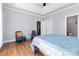 Main bedroom with hardwood flooring and ample closet space at 1319 Sam Cox Ln, Wingate, NC 28174