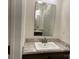 Bathroom with a marble countertop sink and a large mirror at 133 Plank Barn Ln, Stony Point, NC 28678