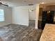 Open kitchen with stainless steel appliances and hard surface flooring at 133 Plank Barn Ln, Stony Point, NC 28678