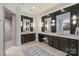 Beautiful bathroom features a tile floor, dual vanities, and separate walk-in shower at 17639 Stuttgart Rd, Davidson, NC 28036