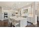 Bright kitchen featuring stainless steel appliances, a large island, and elegant pendant lighting fixtures at 17639 Stuttgart Rd, Davidson, NC 28036