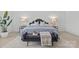 Beautifully staged bedroom featuring a luxurious bed, elegant details, and soothing ambiance at 2461 Palmdale Walk Dr, Fort Mill, SC 29708