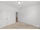 Bedroom with neutral carpet and a closet, perfect for a comfortable living space at 2461 Palmdale Walk Dr, Fort Mill, SC 29708