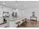 Contemporary kitchen with a large island, stainless steel appliances, and pendant lights at 2461 Palmdale Walk Dr, Fort Mill, SC 29708