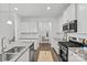 Modern kitchen featuring stainless steel appliances and granite countertops at 2461 Palmdale Walk Dr, Fort Mill, SC 29708