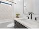 This bathroom includes a modern vanity and a tub-shower combination at 3907 Plainview Rd, Charlotte, NC 28208