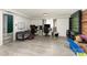 Large basement with a white accent wall and multiple computer setups, perfect for a game room at 4000 Elizabeth St, Hickory, NC 28601