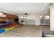 Spacious basement with brick fireplace, gray floors, neutral walls, and plenty of room for activities at 4000 Elizabeth St, Hickory, NC 28601
