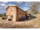 Exterior of a brick home featuring an attached garage and a spacious yard at 4000 Elizabeth St, Hickory, NC 28601