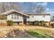 Charming split-level home featuring light gray siding, an A-frame roof, and a well-maintained front yard at 4000 Elizabeth St, Hickory, NC 28601