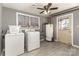 Laundry room with washer, dryer, neutral walls, and wood-look floors at 4000 Elizabeth St, Hickory, NC 28601