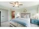 Charming bedroom with stylish furnishings, neutral decor, and access to the hallway at 4230 Black Ct # 235, Harrisburg, NC 28075