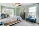 Inviting bedroom with large windows, neutral decor, and comfortable furnishings at 4230 Black Ct # 235, Harrisburg, NC 28075