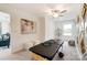 Multi-purpose flex room featuring a massage table and modern decor at 4230 Black Ct # 235, Harrisburg, NC 28075