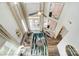 Open-concept living room with tall ceilings, modern decor, and access to outdoor patio at 4230 Black Ct # 235, Harrisburg, NC 28075