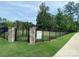 Fenced dog park in Harrisburg Village, offering a secure area for pets to play and socialize at 4236 Black Ct # 234, Harrisburg, NC 28075