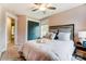 Calm bedroom featuring soft decor, natural light from two windows, and a comforting color palette at 4242 Black Ct # 233, Harrisburg, NC 28075