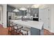 Modern kitchen featuring gray cabinets, stainless steel appliances, a large island, and pendant lighting at 4785 Formation Ct # 101, Lancaster, SC 29720