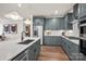 Contemporary kitchen with gray cabinets, stainless steel appliances, and a large center island at 4785 Formation Ct # 101, Lancaster, SC 29720