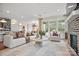 Spacious living room with a fireplace, comfortable seating, and large windows at 4785 Formation Ct # 101, Lancaster, SC 29720