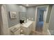 Bathroom boasting a stylish vanity, wall art, and neutral tones creating a relaxing atmosphere at 7005 Stonington Ln, Charlotte, NC 28227