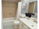 Bright bathroom featuring a tub, tile backsplash, and sleek vanity, offering comfort and style at 7005 Stonington Ln, Charlotte, NC 28227