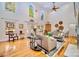 Spacious living room features hardwood floors, large windows, and elegant decor at 8384 Blades Trl, Denver, NC 28037