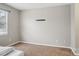 Bedroom showcasing neutral walls, carpet flooring, and a mount for a TV at 9160 Exbury Ct, Charlotte, NC 28269