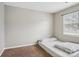 Bedroom featuring neutral walls, carpet flooring, and natural light from a window with blinds at 9160 Exbury Ct, Charlotte, NC 28269