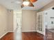 Bedroom with hardwood floors and a doorway to other rooms at 9160 Exbury Ct, Charlotte, NC 28269
