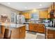 Well-equipped kitchen with stainless steel appliances, granite countertops, and wooden cabinets at 9160 Exbury Ct, Charlotte, NC 28269