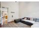 Bright living room with high ceilings, wood floors, and abundant natural light at 9160 Exbury Ct, Charlotte, NC 28269