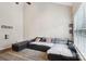 Bright living room with high ceilings, wood floors, and abundant natural light at 9160 Exbury Ct, Charlotte, NC 28269