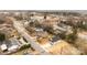 Aerial view of a home in its neighborhood, with nearby businesses, street, and yards at 923 Cedar St, Salisbury, NC 28144