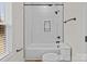 Modern bathroom showcasing subway-tiled bathtub and black fixtures and hardware at 923 Cedar St, Salisbury, NC 28144