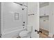 Modern bathroom with subway tile bathtub and shower featuring black hardware at 923 Cedar St, Salisbury, NC 28144