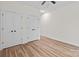 Bedroom features wood-look floors, closet with double doors, and neutral walls at 923 Cedar St, Salisbury, NC 28144