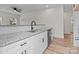 Modern kitchen with granite counters, stainless steel appliances, and ceiling fan at 923 Cedar St, Salisbury, NC 28144