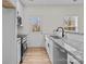 Modern kitchen features granite countertops, stainless steel appliances, and a bright, clean design at 923 Cedar St, Salisbury, NC 28144