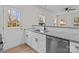 Kitchen featuring white cabinets, granite countertops and stainless steel appliances at 923 Cedar St, Salisbury, NC 28144