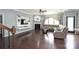 Bright living room with hardwood floors, fireplace, and a comfortable seating area at 1035 Ivey Ct, Fort Mill, SC 29707
