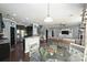 Open concept living space with combined kitchen and dining with a view to the living room at 1035 Ivey Ct, Fort Mill, SC 29707