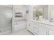 Elegant bathroom showcasing double vanity, large soaking tub, and walk-in shower for a luxurious feel at 108 Sari St, Troutman, NC 28166