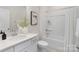 Fresh bathroom with a single sink vanity, a shower-tub combo, and white finishes for a clean, modern feel at 108 Sari St, Troutman, NC 28166