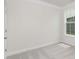 Comfortable bedroom with plush carpeting and natural light streaming through the window at 108 Sari St, Troutman, NC 28166