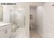 Modern bathroom with a glass-enclosed shower and vanity with a large mirror at 110 Noah Ln, Troutman, NC 28166