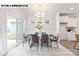 Elegant dining area with modern furnishings, natural light, and easy access to outdoor space at 110 Noah Ln, Troutman, NC 28166
